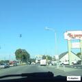 Person experiencing difficulty breathing at Bellflower intersection