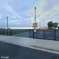 Speeding car nearly hits pedestrian near high school