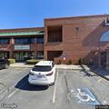 Person sleeping under table at Buford Highway
