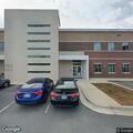 Intoxicated person causing disturbance at clinic