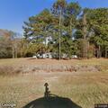 Woods fire threatens structure on Myrtle Beach Highway