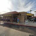 Person with breathing problem near Bell Liquor in Moreno Valley