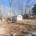Mobile home fire with resident having trouble breathing