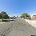 Woman found lying on the ground under a tree