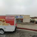Adult slumped over unresponsive in car at parking lot