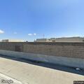 Person with abdominal pain at clinic in Lynwood