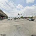 Man waving machete at people near tire shop
