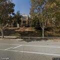 Person with abdominal pain in apartment complex