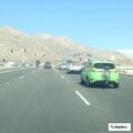 Stopped car on blind curve on Highway 215