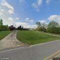 Tree blocking roadway on Airport Road