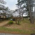 Person pounding on door of elderly woman’s home