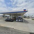 person experiencing difficulty breathing at gas station