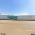 Person falls inside store, breathing but unconscious