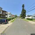 Vehicle with downed wires on Milford Street