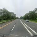 Overturned car with fire on Meadowbrook Parkway