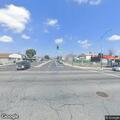 Man spray painting walls near Arizona and Olympic
