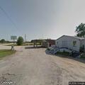 Delivery truck hits power line at private lot