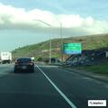 Black car blocking right lane on CA-60 on-ramp