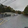 Officer stops gray Chevy Equinox at business
