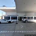 Person with gunshot wound at car dealership