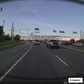 Suspicious van unloading on roadside grass