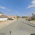 Person lying in road on Drexel Dr in Walnut