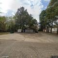 Burglary alarm and open door at Magnolia Drive