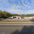 Deer reported in roadway near body shop