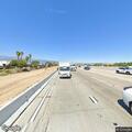 Stalled sedan on I-15 off-ramp at SR-60