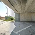 Person urinating outside vehicle on freeway