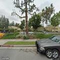 Person experiencing abdominal pain near West Covina