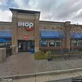 Woman reports chest pain at Medlock Bridge Rd near IHOP