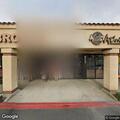 Person experiencing back pain at Sierra Avenue location