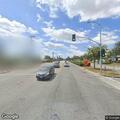 Person experiencing shortness of breath at intersection