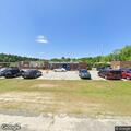 Suspicious person possibly unconscious at school parking lot
