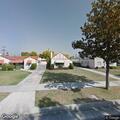 Person with back pain found sitting at residence