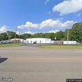 Two vehicles crash in storage lot parking area