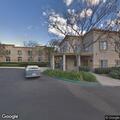 Person experiencing abdominal pain at care facility