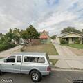 Battery suspect wearing security shirt at residence