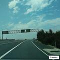 Man reportedly hitting woman on highway ramp