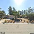 Person experiencing chest pain at home in Azusa