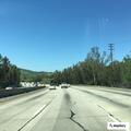 Car swerving across lanes on US-101 in Calabasas