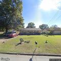 Grass fire spreads to house on West 13th Avenue