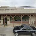 Traffic stop on black Silverado at Cotton Museum