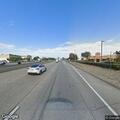 Car stopped on highway shoulder near Oxnard