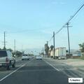 Officer checks person at gas station