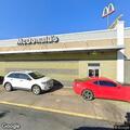 Car hits building at McDonald's in White Hall