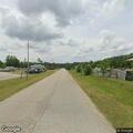 Man falls on cement and vomits near Highway 34