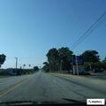 Man pulling car door handles and yelling at drivers