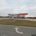 Red and black car leaving Albertville with driver issue